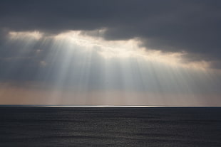 sun rays through clouds HD wallpaper