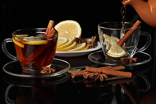 two glass cups with tea