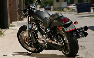 black cruiser motorcycle on road HD wallpaper