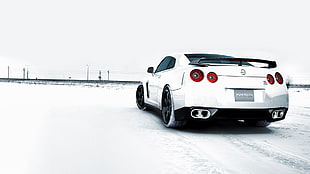 photo of white car during snow season HD wallpaper