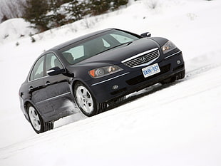 black Acura sedan on snowfield HD wallpaper