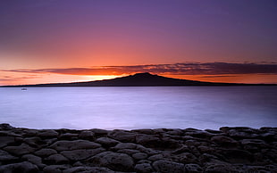 photography of silhouette of mountain during golden hour HD wallpaper