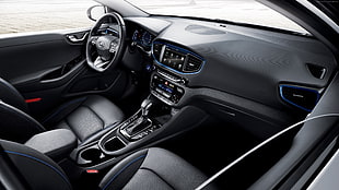black car interior with dashboard, steering wheel, and 2-DIN car stereo head unit HD wallpaper