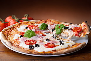 food photography of pizza served on plate HD wallpaper