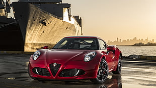 red coupe in front of ship HD wallpaper