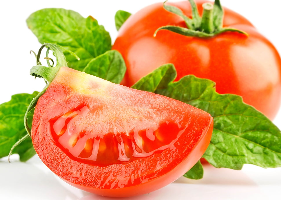 closeup photo of sliced red tomato HD wallpaper