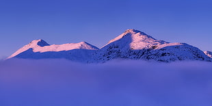 mountain range covered in snow during daytime HD wallpaper