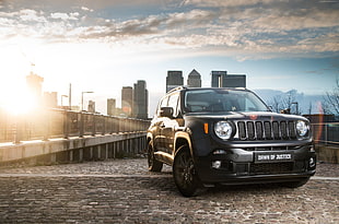 photo of Jeep compact SUV with high rise buildings during day time HD wallpaper