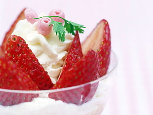 sliced strawberry with whip cream on clear glass bowl HD wallpaper