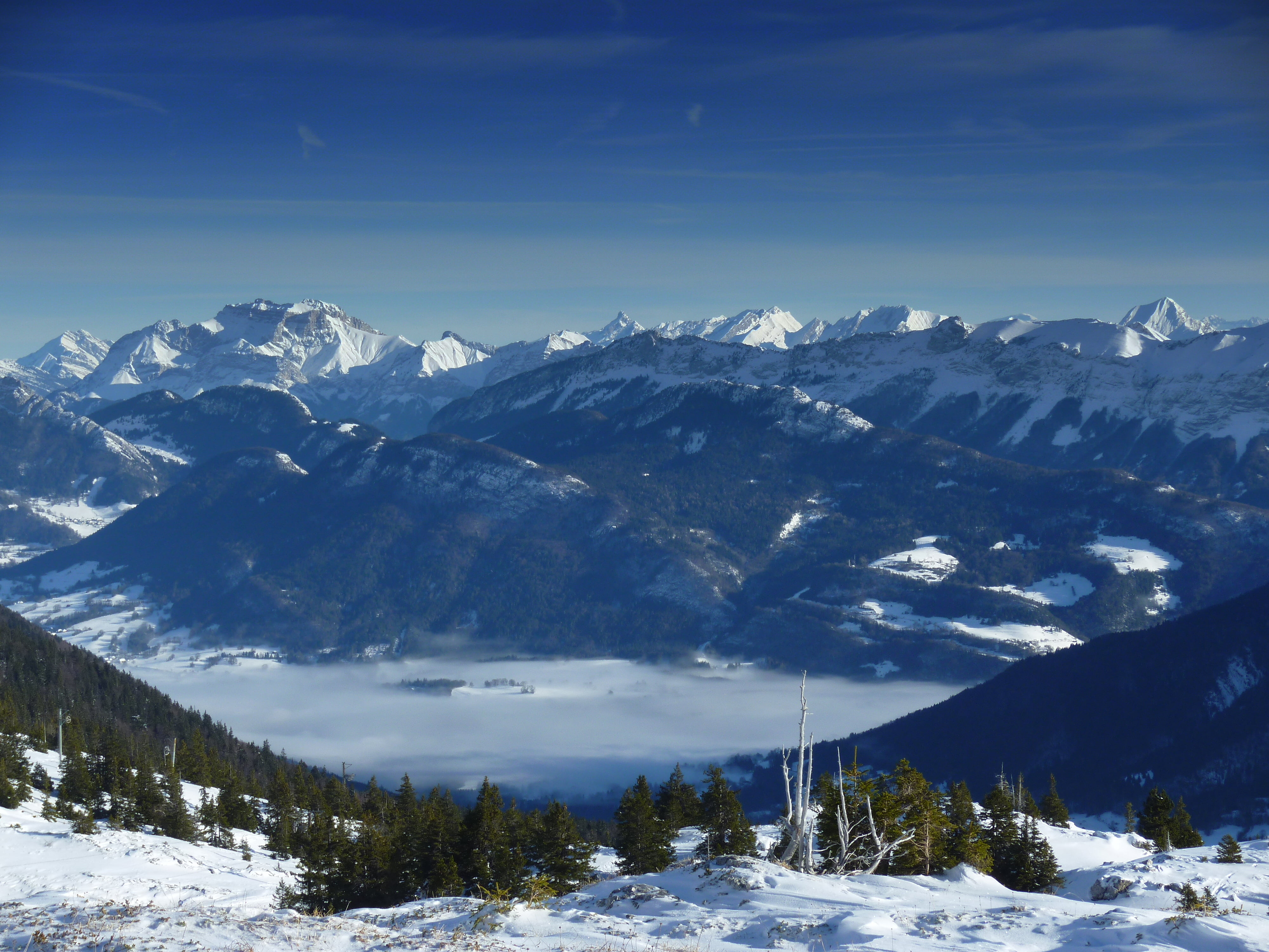 birds eye view photography of snowy mountain during sunrise