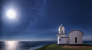 white lighthouse near body of water, Moon, starry night, sea, moonlight HD wallpaper