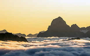 aerial view of mountain ranges with sea of clouds