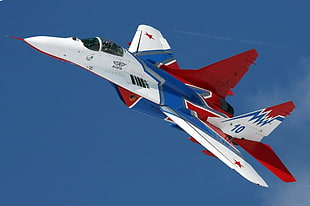 white, blue, and red fighting plane HD wallpaper