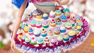 female wearing cupcake dress doll, doll, closeup, cupcakes, skirt