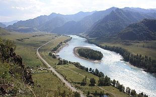 top angle photography of blue river water surrounded by land taken during daytime HD wallpaper