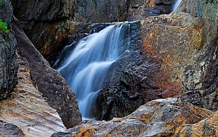 brown and black rock waterfalls HD wallpaper