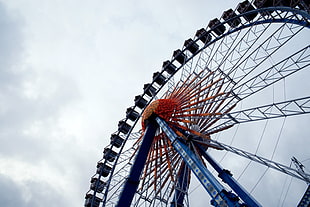 low angle photography of Ferris Wheel under nimbus clouds background HD wallpaper