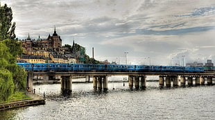 blue and white concrete building, architecture, Stockholm, Sweden, train