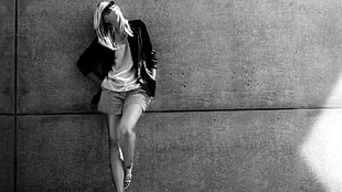 grayscale photo of woman in black jacket and short shorts standing HD wallpaper