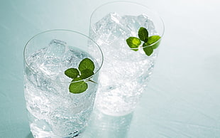 two clear glass cups filled with ice HD wallpaper