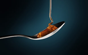 brown syrup on spoon HD wallpaper