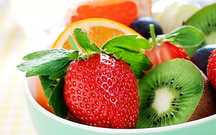 variety of fruits on white ceramic bowl