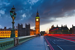 person walking near Big Ben in London HD wallpaper