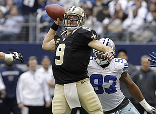 football player wearing black 9 football jersey