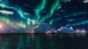 landscape photography of glacier with northern lights