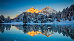 mountain and trees reflects on calm lake water at daytime, mountains, snow, reflection HD wallpaper