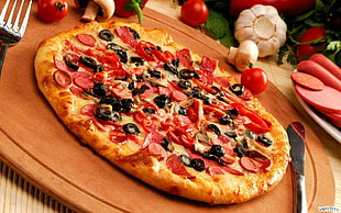 pepperoni with black olive pizza on brown wooden tray with knife and fork HD wallpaper
