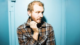 men wearing black and brown plaid dress shirt