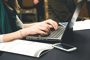 person working on her laptop