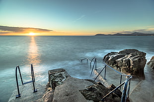 ladder on shore under gray sky, dalkey, dublin, ireland HD wallpaper