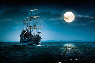 sailing boat under full moon during nighttime HD wallpaper
