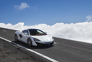 white super car on highway