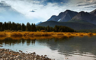 calm body of water, mountains, water, sky, clouds HD wallpaper