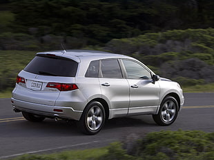 silver SUV on road during daytime HD wallpaper