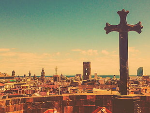 photo of cross on top of rooftop during day time HD wallpaper