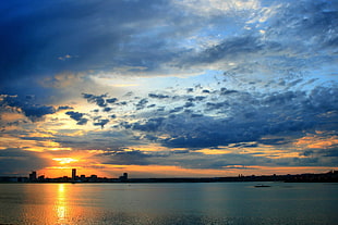 body of water, sky, landscape, sea, city