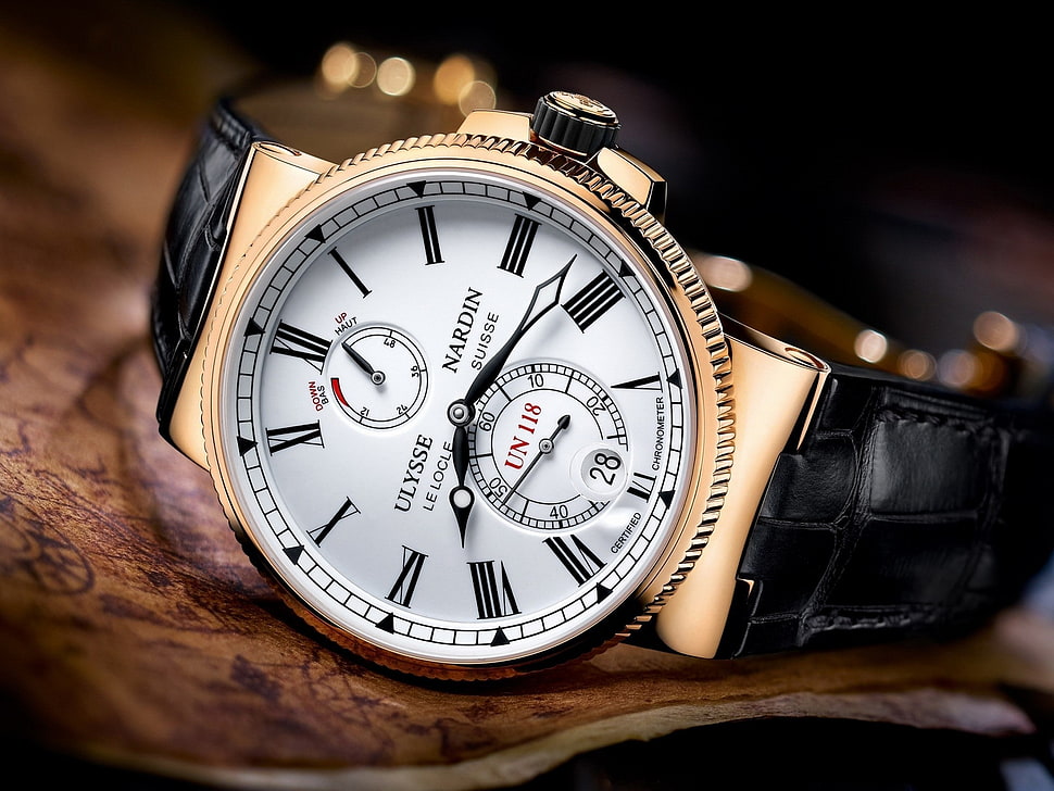 round gold-colored Ulysse Nardin chronograph watch with black leather strap HD wallpaper
