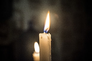 selective focus photography of lighted taper candle HD wallpaper