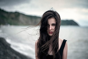 woman wearing black scoop-neck sleeveless dress portrait photography