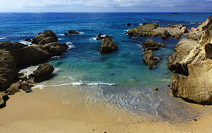 rock formation and body of water