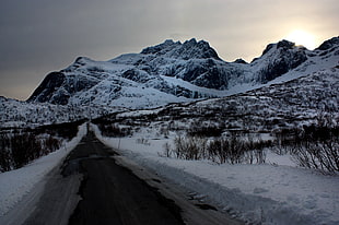 white and brown snowy mountain during cloudy sky