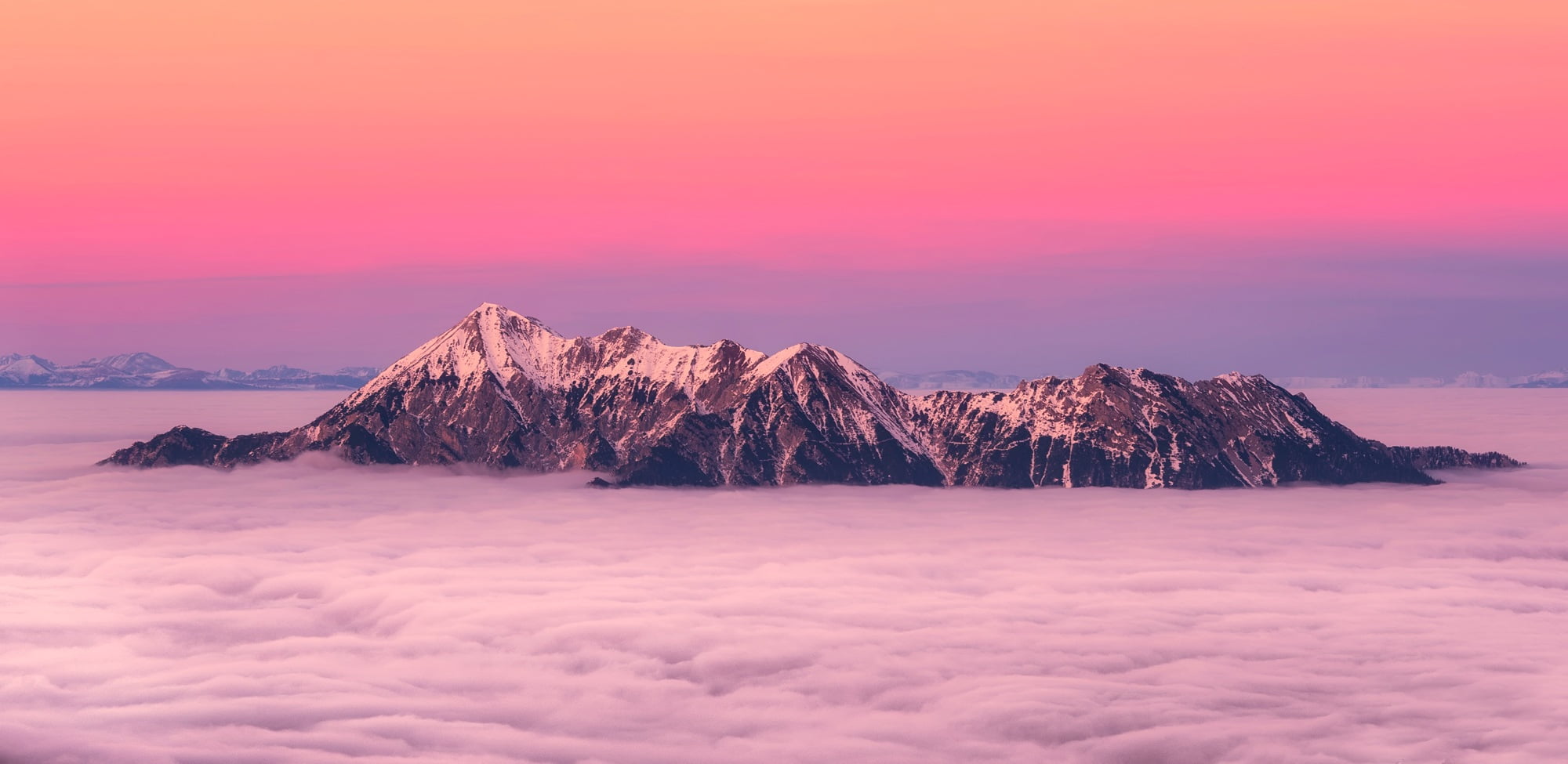 landscape photo of snow covered mountain during golden hour