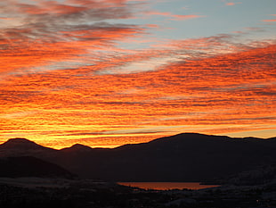 silhouette of mountain during sunset