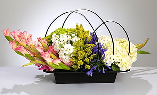assorted flowers in black metal basket HD wallpaper