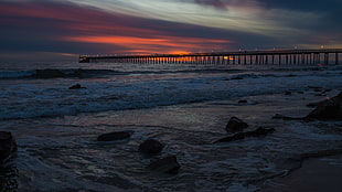 photo of sea and bridge HD wallpaper