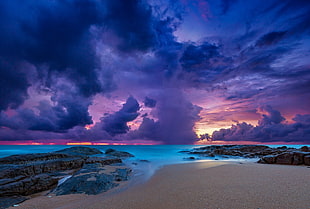 brown sand beach with blue sky and cloud photo, thailand